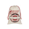 A cream flax linen drawstring bag with a festive red print featuring a reindeer and Christmas graphics.