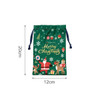 A green polyester drawstring gift bag featuring festive designs, including Santa, reindeer, and snowflakes.