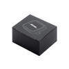 A black packaging box for a product, featuring a minimalist design and a logo on the top.