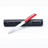 A metal ball pen with a white barrel and red accents, resting on a black case with a logo.