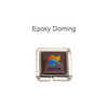 A square, foldable desk hook with a shiny silver finish and a coloured epoxy doming featuring a logo.