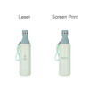 A drink bottle in mint green with a grey lid, featuring a logo and a handy carry strap. Double wall stainless steel design.