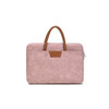A pink suede PU leather laptop bag with brown handles and a sleek design. It features a logo on the exterior.