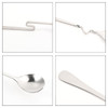 A stainless steel spoon with a unique hanging design, featuring a curved and straight end, set against a white background.