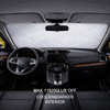 An aluminum snow cover inside a car, featuring a light silver colour, with dark leather seats and dashboard.