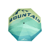 A 21'' automatic compact folding umbrella in green and teal with a mountain design and logo.