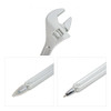 A spanner-shaped ballpoint pen in metallic silver with a shiny finish and detailed design elements.
