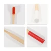 A colourful bamboo toothbrush with a large round handle featuring red bristles, white and red sections.