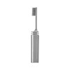 A foldable toothbrush in silver, featuring a sleek design and a built-in cover for convenience.