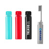 A foldable toothbrush in silver with a brush head, accompanied by blue, red, and black dental-themed containers.