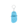 A blue classic clog shoe keyring featuring ventilation holes and a metal chain attachment.