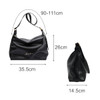 A black polyurethane tote bag with a shoulder strap, featuring a logo and dimensions displayed alongside.