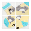 Custom patterned woven socks in yellow with a fluffy grey animal design and blue accents. Features branding.