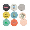 A round makeup mirror with various coloured and branded covers, featuring a reflective surface inside.