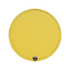 A round makeup mirror in bright yellow with a textured finish and a silver snap button.