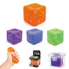 A collection of colourful, swirled stress relief cubes in orange, purple, and green, with a hand squeezing one.