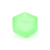 A squishy stress relief cube in a light green colour with a smooth, glossy surface. It has a simple cube shape.