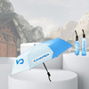 A blue and white anti-rebound folding umbrella with a logo, displayed on a pedestal with a backdrop of mountains.