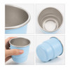 A stainless steel round bottom camping mug in light blue, showcasing its interior and exterior design. Features a logo.