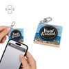 A square acrylic keychain with a vinyl record design, featuring a silver clip and an NFC symbol in the corner.
