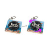 A square acrylic keychain with a vinyl record design, featuring a beach scene on one side and a spinning feature.