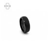 A black carbon fibre ring featuring an engraved design and an NFC logo. It has a sleek, modern appearance.