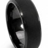 A black carbon fibre ring with a smooth, polished finish and a sleek design. It features a logo.