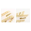 A satin narrow scarf featuring a yellow and white checkered pattern with a gold logo.