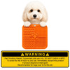 An orange 4-section lick mat with various textures held by a fluffy dog, featuring a warning label at the bottom.