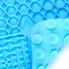 A blue, three-section silicone lick mat with varied textured patterns including honeycomb, bones, and rounded dots.