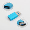 A USB data blocker in blue with a metallic finish, featuring a standard USB connector on each end.