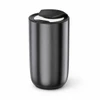 A sleek black diffuser with a lid, featuring a simple design and a logo on the side.
