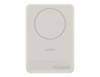 A slim white power bank with a circular magnetic area and branding on the back.