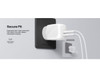 A dual USB-C wall charger in white connected to a power outlet, featuring a solid design for secure fit.