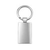 A silver keytag with a rectangular frame and a keyring attachment. The surface is smooth and reflective.