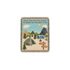 A tapestry blanket featuring a camping scene with mountains, trees, a tent, and a blue van, in earthy tones.