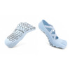 Light blue yoga toe socks with grip soles and cross straps, featuring a textured pattern on the underside.