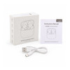 A box of white half in-ear design earbuds, a USB charging cable, and an instruction manual. The box features branding.