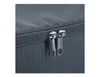 A close-up of a black insulated lunch bag featuring dual zippers and a textured fabric.