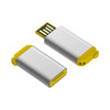 A silver flash drive with yellow accents, featuring a USB connector and a small removable cover.