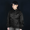 A black windbreaker jacket with a hood, featuring a front zipper and side pockets, worn by a model.