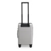 A silver carry-on suitcase with a retractable handle and wheels, featuring a simple design and a logo.