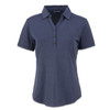 A navy women's polo shirt with a collared neck and five-button placket, featuring a branding logo.