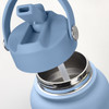 A drink bottle in soft blue with a stainless steel interior and a straw attachment, featuring a secure lid.