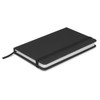 A black notebook with a sleek cover, featuring a white spine and a black elastic band for closure.