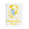A pocket notebook featuring a colorful bird design and the text "Beaking Bird," accompanied by a pen.