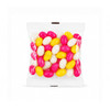 A clear cello bag filled with pink, yellow, and white jelly beans, showcasing a variety of vibrant colours.