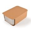 A Bermuda Lunch Box featuring a sleek design with a natural brown outer sleeve and a smooth white container inside.