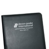 A black A4 pad cover features a logo on the front, suitable for office use in a professional setting.