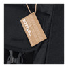 A black cooler bag with a tag that reads about its recycled material, featuring a bottle holder on the side.